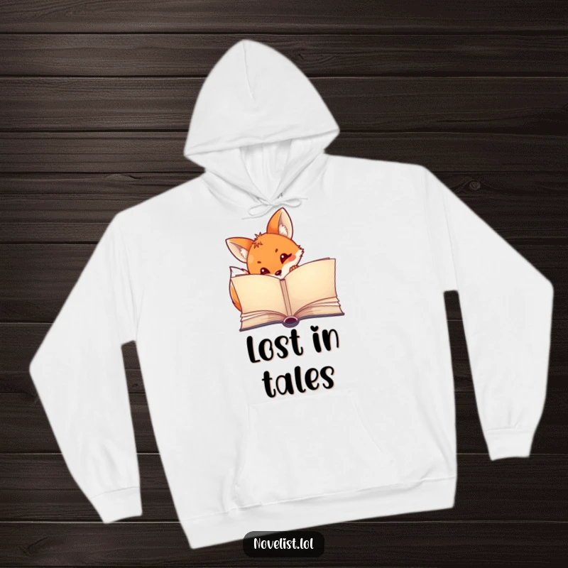 Funny hoodie with a curious fox peeking from a large, open storybook, perfect for cozy reading and imaginative minds.