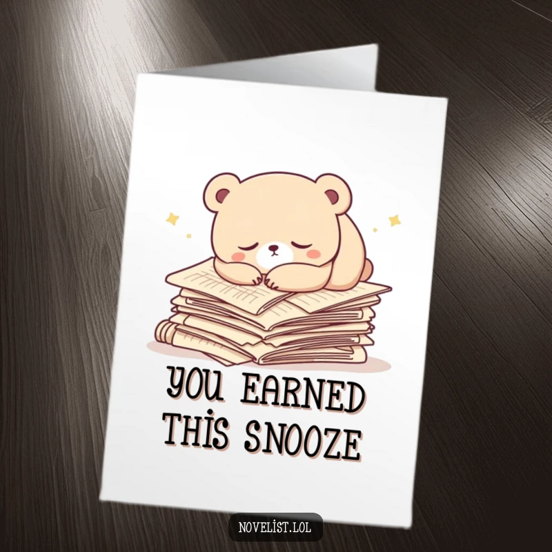 Funny Free Printable Congratulations Card: Tired bear character fast asleep on a mountain of manuscript papers, celebrating a well-deserved rest.